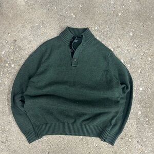 Thick Izod collared knitted sweater.